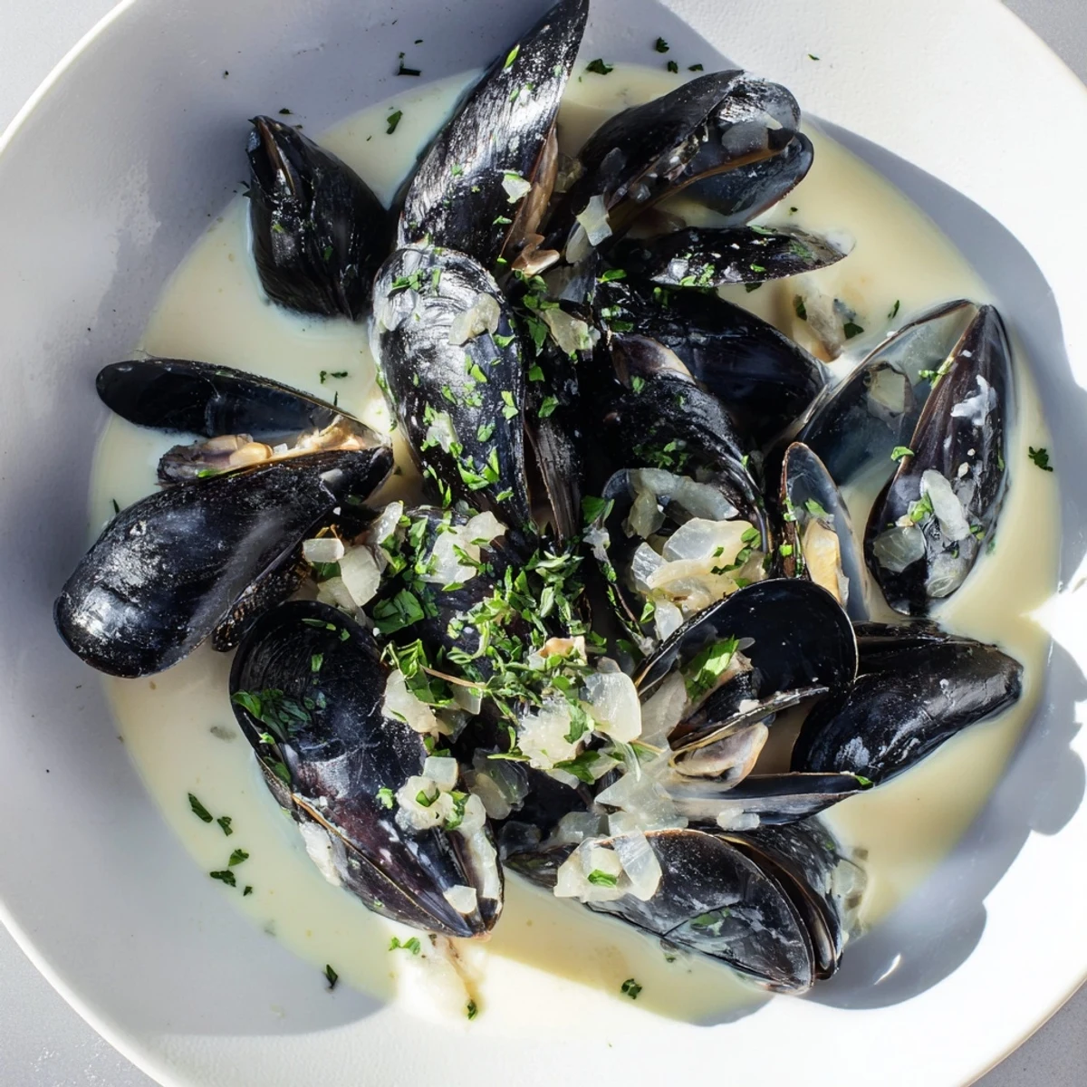 Fragrant garlic and herbs accent the buttery sauce of these 30-Minute Classic Creamy Mussels, ready in a half-hour.