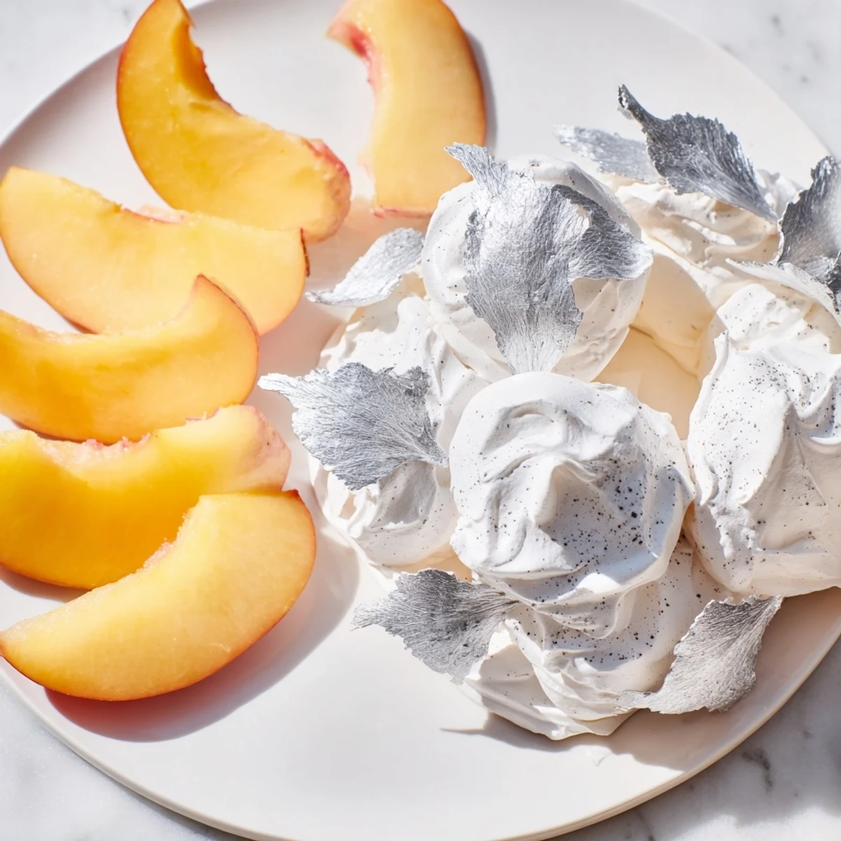 This dreamy Pearly Gates appetizer showcases elegant brie, sliced peaches, and delicate meringue kisses.