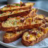 Twice-baked Italian cookies with candied orange peel and orange zest, ideal for dessert or snacks.  