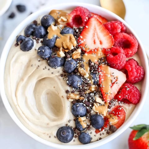 A delicious Protein Ice Cream Bowl, creamy and ready to be customized with your favorite toppings.