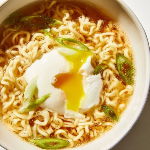 Upgrade instant ramen with a perfectly cooked egg and a swirl of melted butter, a quick lunch.
