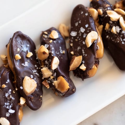 Layers of date bark Snickers-style: the sweet, frozen dessert featuring peanut butter and dark chocolate.