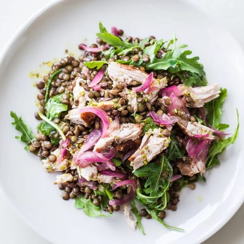 A fresh platter of Lentil & Chicken Spring Salad featuring juicy roasted chicken and a bright, homemade Dijon vinaigrette.  