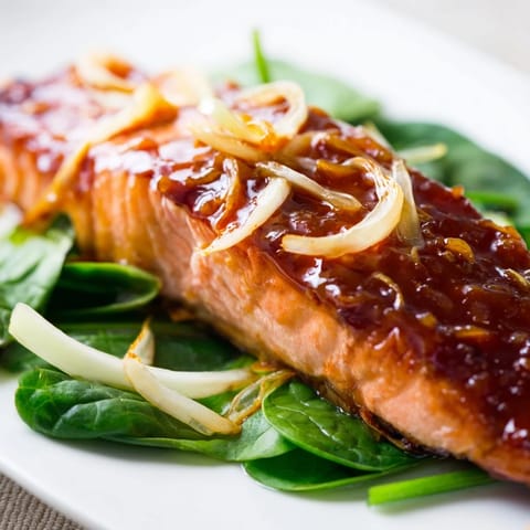Miso salmon served over tender spinach, ready to pair with steamed rice or quinoa.