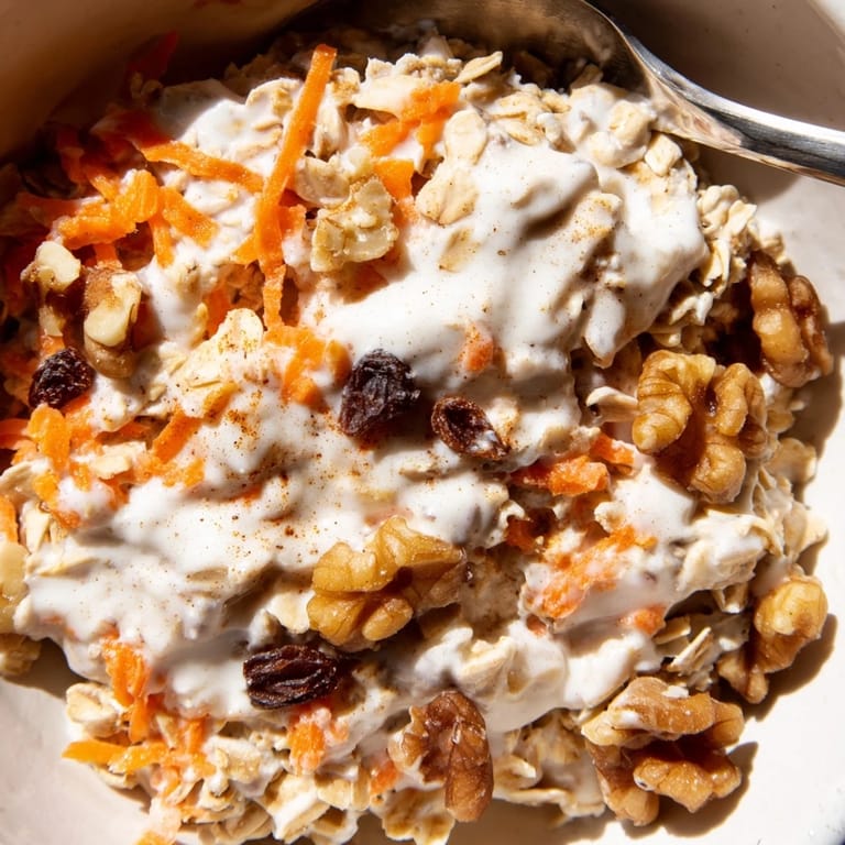 Homemade Carrot Cake Overnight Oats, full of textures: oats, nuts, and a sweet, creamy yogurt base.